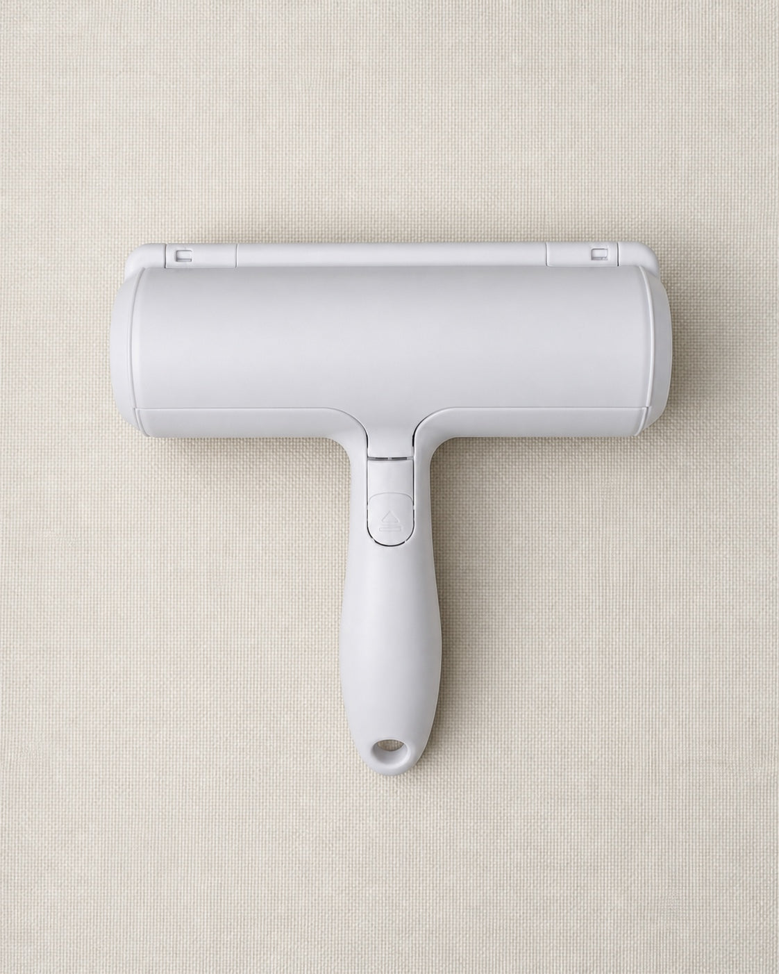 Reusable pet hair roller on fabric upholstery